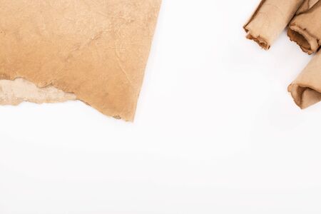top view of vintage rolled paper isolated on whiteの写真素材