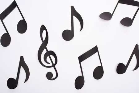 Close up view of paper cut black notes on white backgroundの写真素材