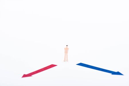 Concept of equality with people figure near red and blue pointers isolated on whiteの写真素材