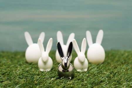 Decorative bunnies on grass, easter concept