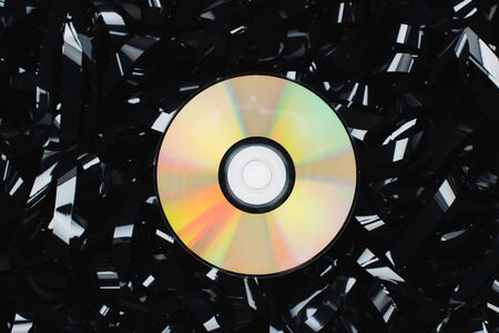 top view of CD disc on black film stripの写真素材