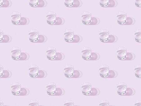 glasses of fresh water on violet, seamless background pattern