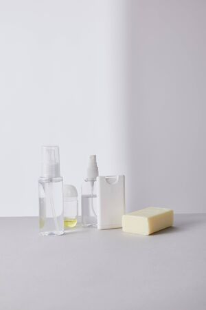 hand sanitizer in bottles and antibacterial soap on white backgroundの写真素材