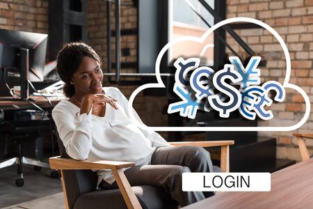 smiling, pregnant african american businesswoman sitting in armchair and looking away, currency illustrationの写真素材