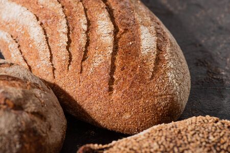close up view of fresh baked brown whole grain bread