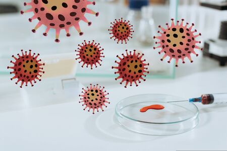 selective focus of syringe and petri dish with blood sample near white mouse in glass box, bacteria illustrationの写真素材