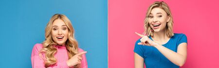 Panoramic shot of smiling blonde sisters pointing with fingers at each other on pink and blue backgroundの写真素材