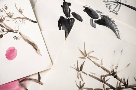 Top view of paper with Japanese painting on surface