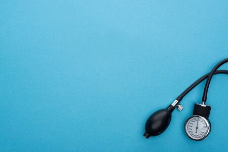 top view of sphygmomanometer on blue backgroundの写真素材