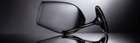 broken sharp transparent glass in dark, panoramic cropの写真素材