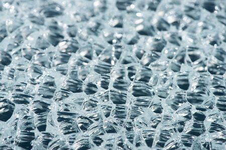 close up view of abstract transparent ice textured background