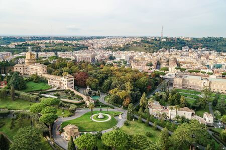 gardens of Vatican near historical buildings in italyの写真素材