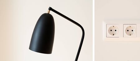 collage of black and modern lamp and power sockets on white wallの写真素材