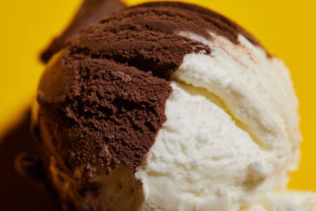 close up view of tasty brown and white ice creamの写真素材