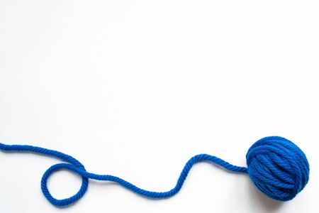 top view of blue wool yarn on white backgroundの写真素材
