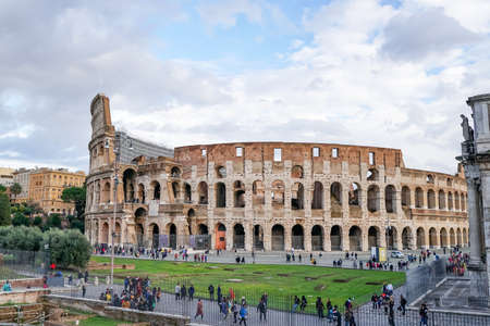 ROME, ITALY - APRIL 10, 2020: people near ancient colosseum in romeのeditorial素材
