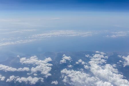 Aerial view of clouds above sea and coast of Catalonia, Spainの写真素材