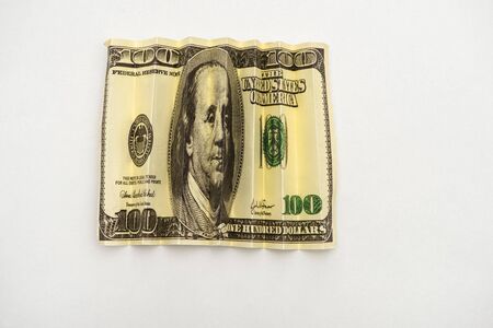 top view of crumpled american dollar banknote isolated on white