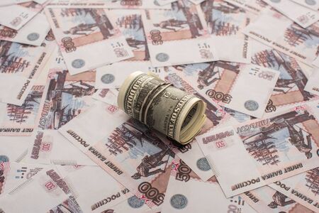 dollars cash roll on russian ruble banknotesの写真素材