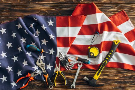 top view of instruments on american flag, labor day conceptの写真素材