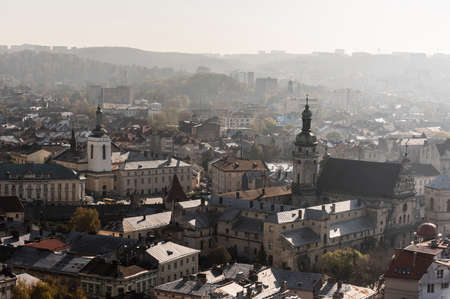 aerial view of city hall tower and dormition church in historical center of lviv, ukraineのeditorial素材