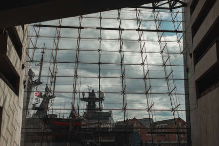 COPENHAGEN, DENMARK - APRIL 30, 2020: View from Black Diamond Royal Library on ship and cloudy sky at background, Copenhagen, Denmarkのeditorial素材