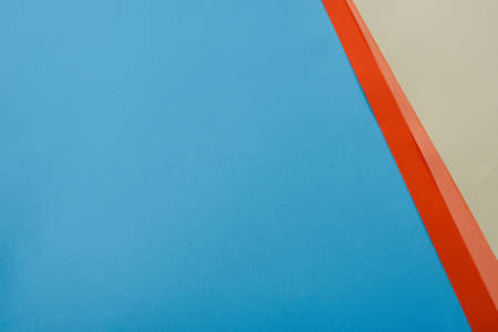 abstract geometric background with blue, orange, yellow paperの写真素材