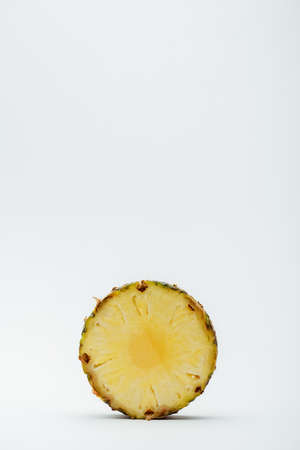 delicious sweet cut pineapple on white backgroundの写真素材