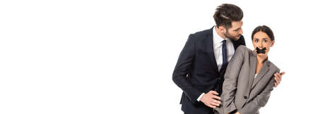 website header of businessman in formal wear molesting businesswoman with duct tape on mouth isolated on whiteの写真素材