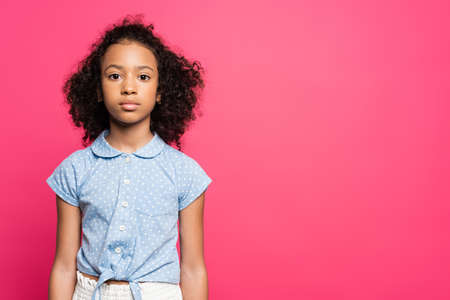 cute curly african american kid isolated on pinkの写真素材