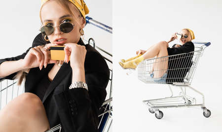 collage of fashionable woman in black and yellow outfit posing with credit card in shopping cart isolated on whiteの写真素材