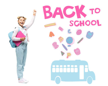 Schoolgirl with laptop and backpack showing yeah gesture near back to school lettering and school...