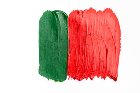 top view of abstract colorful green and red paint brushstrokes on white backgroundの写真素材