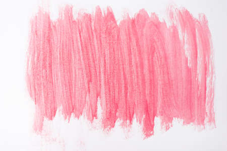 top view of abstract pink paint brushstrokes on white backgroundの写真素材