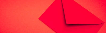 top view of envelope on red background, bannerの写真素材