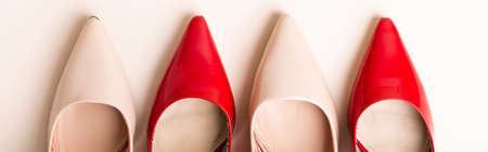 top view of leather heeled shoes on beige background, bannerの写真素材