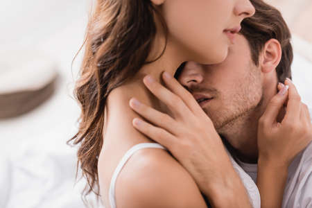 passionate man hugging with seductive young womanの写真素材