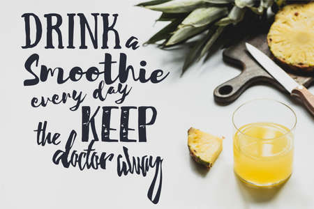 pineapples on cutting board near glass of orange juice and drink a smoothie every day keep the...