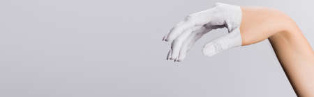 cropped view of hand with painted fingers isolated on white, bannerの写真素材