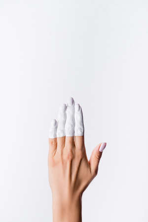 cropped view of hand with painted fingers isolated on white