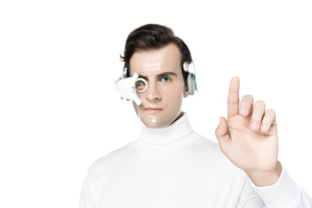 Cyborg in digital eye lens and headphones on blurred background pointing with finger isolated on whiteの写真素材