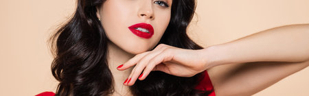 cropped view of brunette young woman with red lips isolated on pink, banner