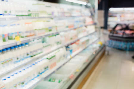 Blurred background of groceries on counters in storeの写真素材