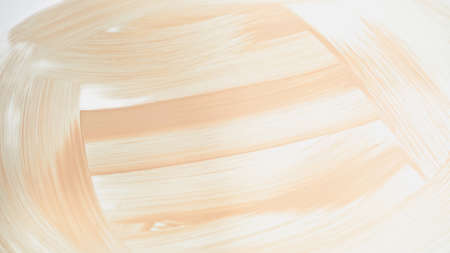 strokes of beige and creamy makeup foundation on whiteの写真素材