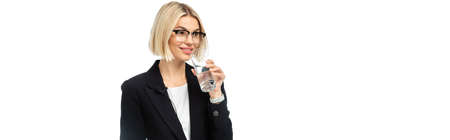 smiling anchorwoman in eyeglasses drinking water isolated on white, banner