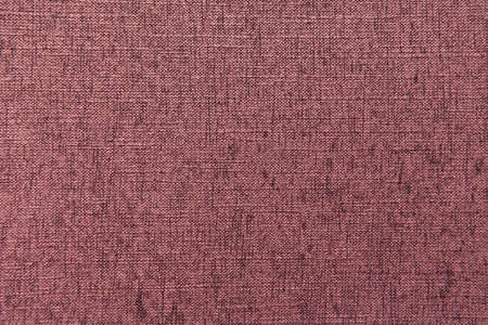 background of dark pink, textured surface with sacking imitation, top viewの写真素材