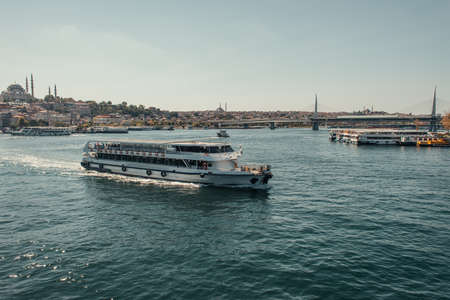 view of city from Bosphorus strait with floating and moored ships, Istanbul, Turkeyの写真素材