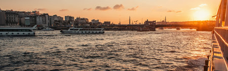 Ships floating on sea water near Istanbul city during sunset, Turkey, banner