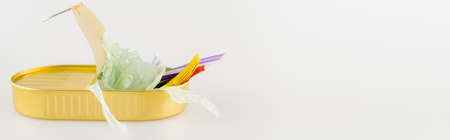 tin with plastic rubbish on white background, ecology concept, bannerの写真素材