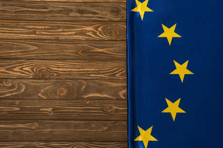 top view of european union flag on wooden surfaceの写真素材